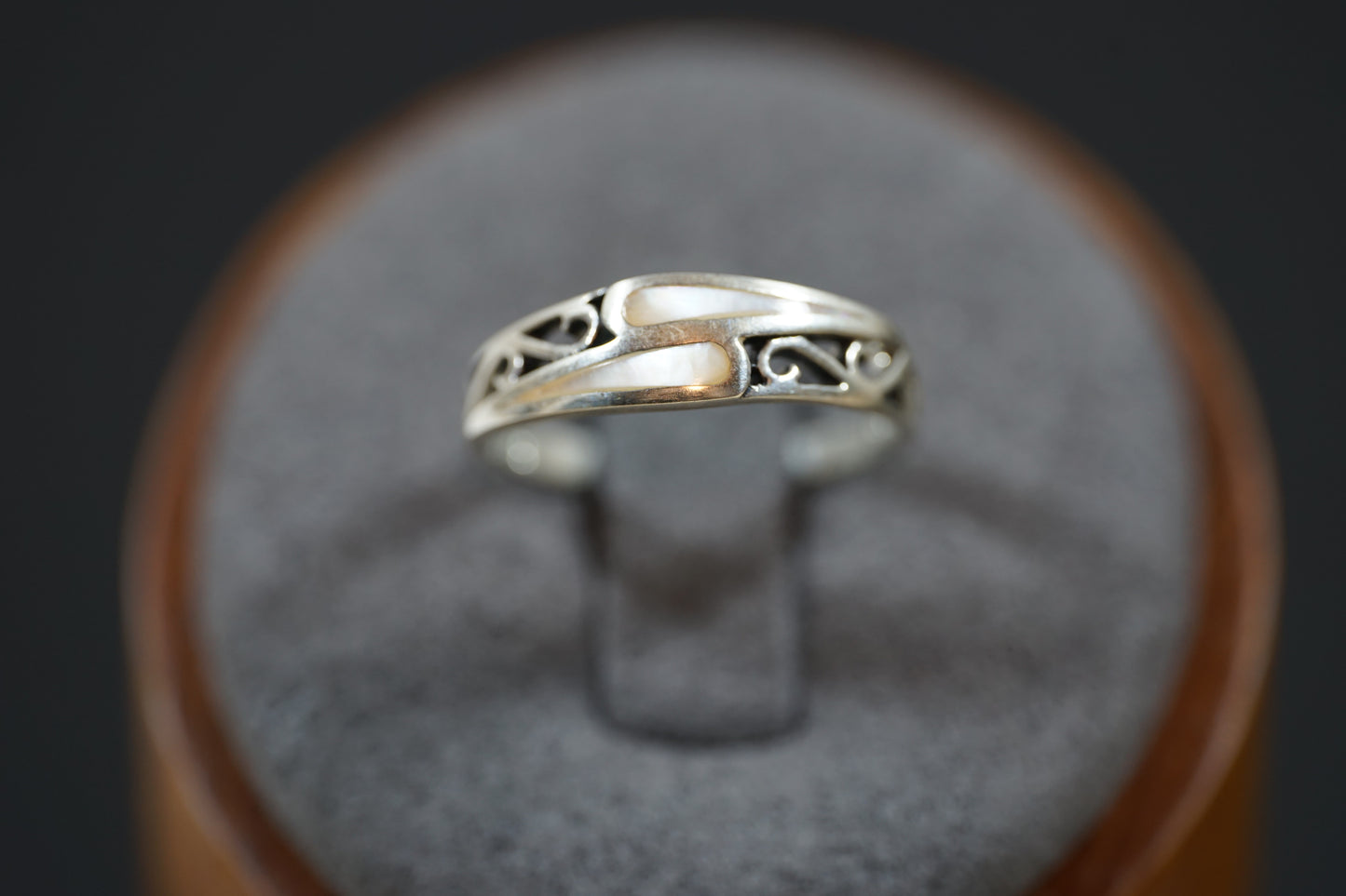 Silver Ring With Intrecate Band Design And Two Gemstones