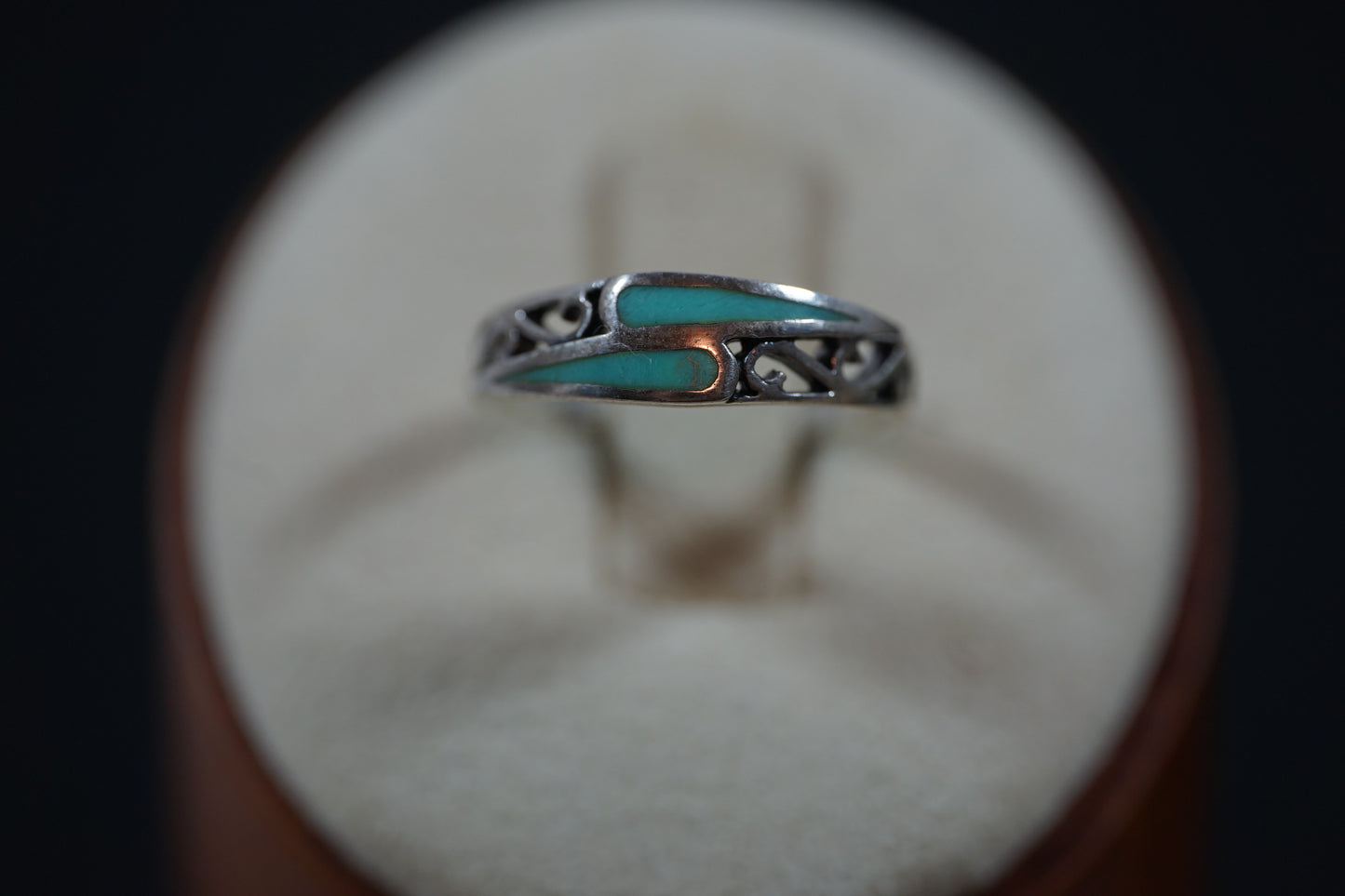 Silver Ring With Intrecate Band Design And Two Gemstones