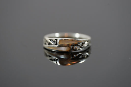 Silver Ring With Intrecate Band Design And Two Gemstones