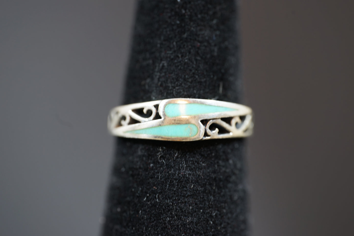 Silver Ring With Intrecate Band Design And Two Gemstones