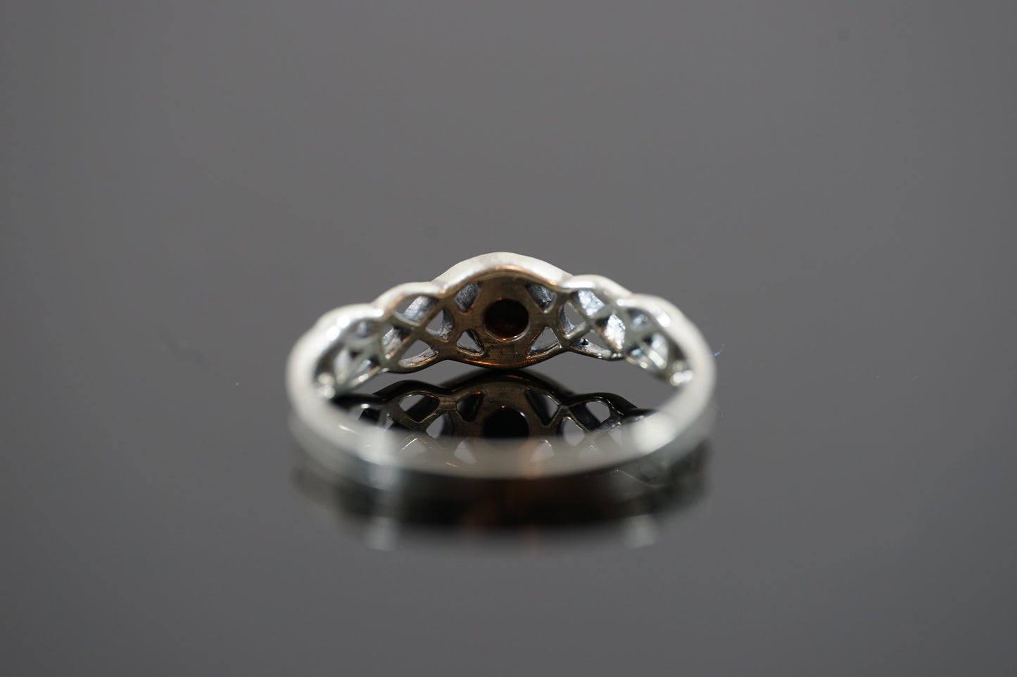 Silver Ring With Gem Stone And Intricate Band Design