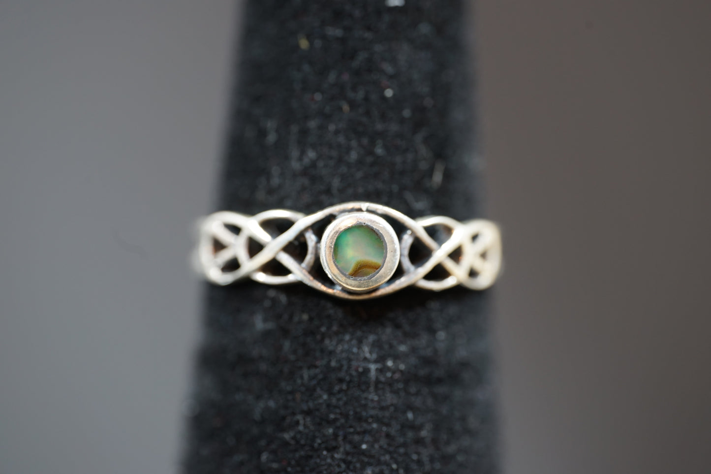 Silver Ring With Gem Stone And Intricate Band Design