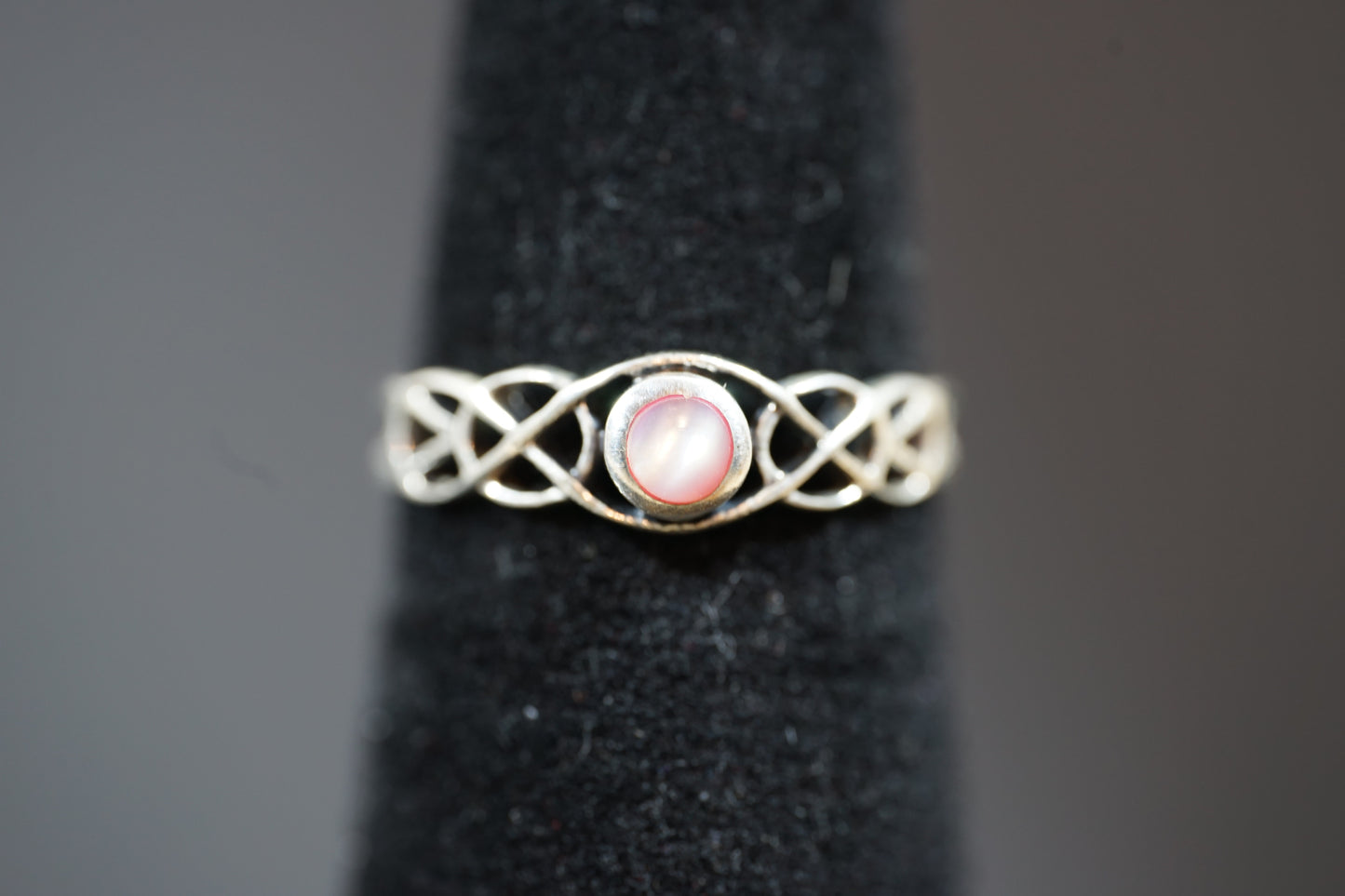 Silver Ring With Gem Stone And Intricate Band Design