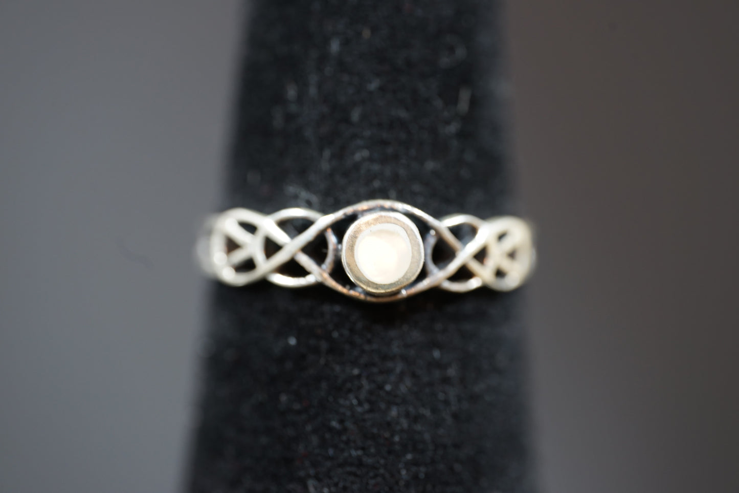 Silver Ring With Gem Stone And Intricate Band Design