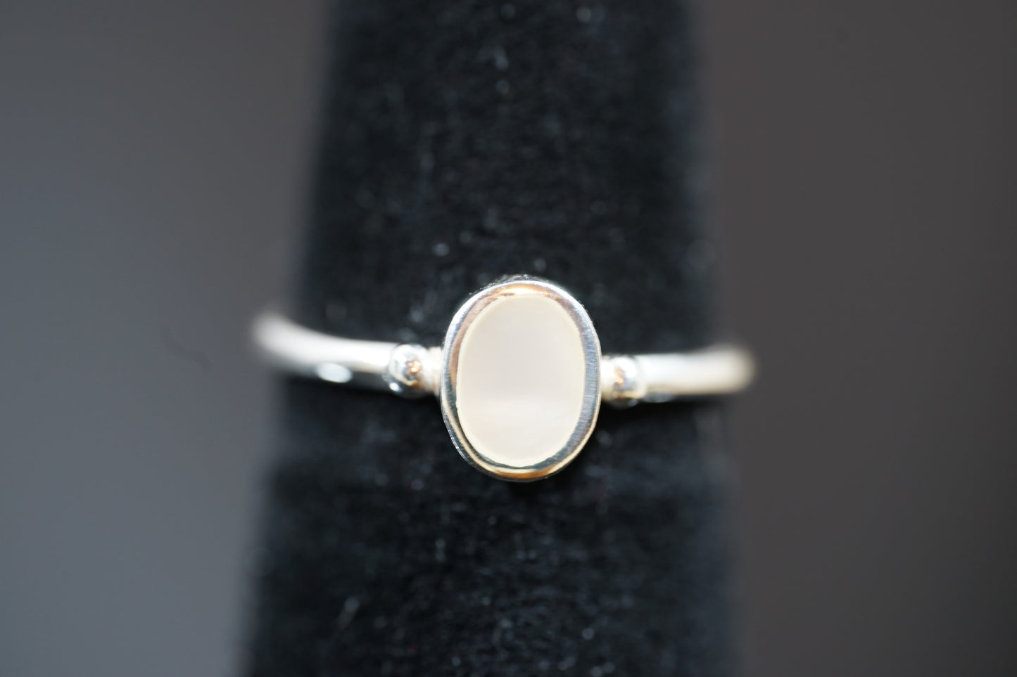 Silver Ring With Oval Gemstone And Two Dots