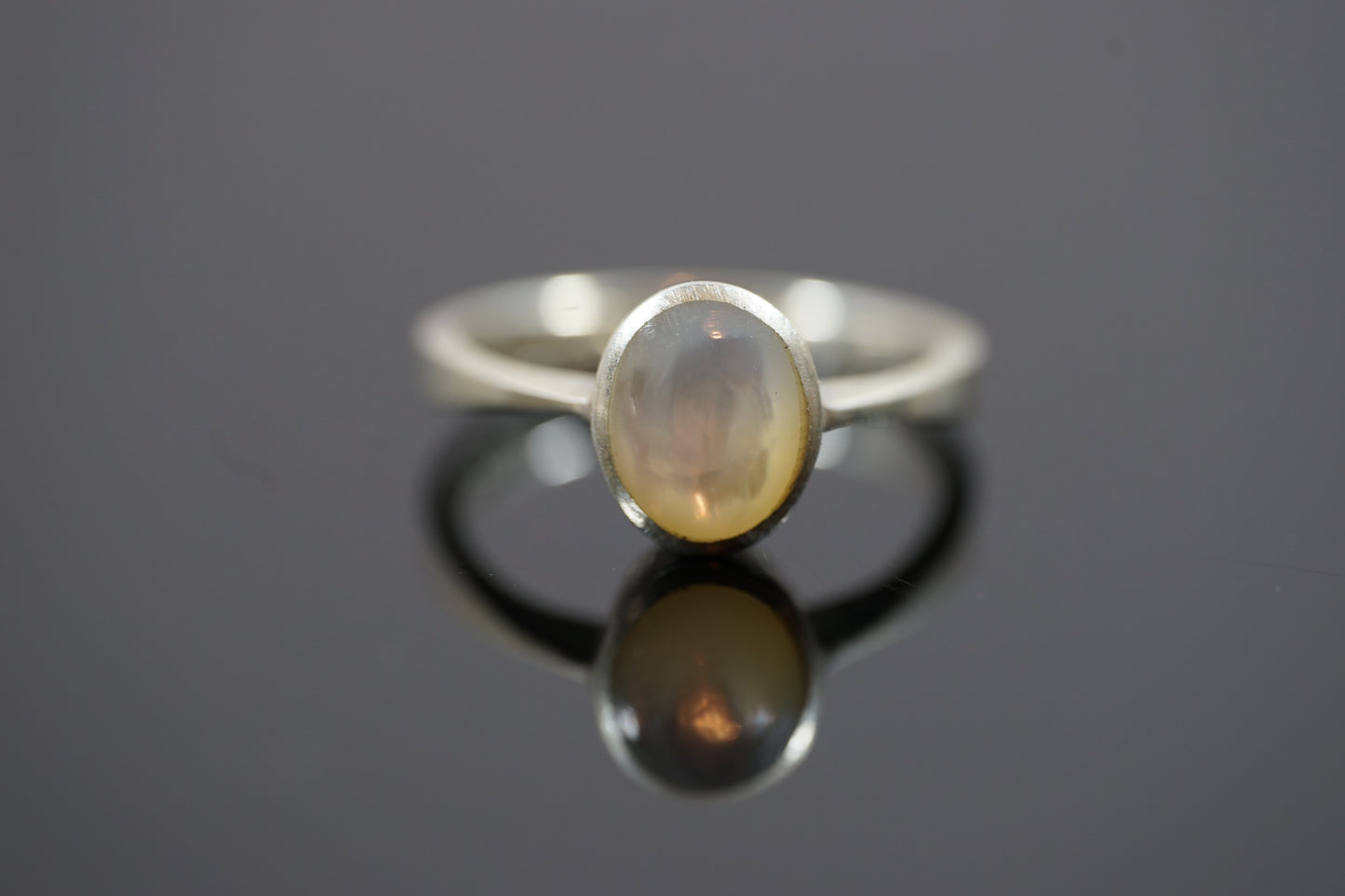 Silver Ring With Thick Band And Round Gemstone